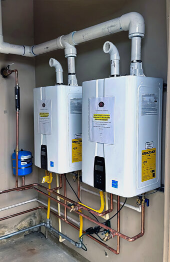 https://sinagrahotwater.com.au/uploads/2025/06/hot-water-servicing-52956.jpg